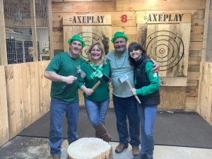 Group celebrating St. Patrick’s Day at Axe Play Hudson NH