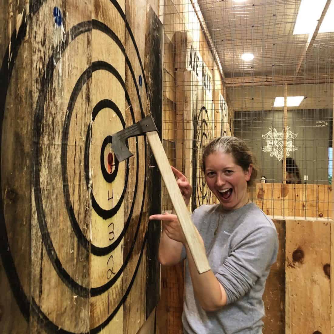 Guest safely enjoying axe throwing at Axe Play in Hudson, NH