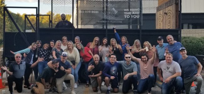 corporate team building nh group photo axe throwing event employees