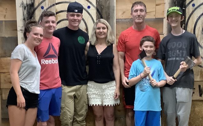 Family enjoying an indoor activity near Nashua NH at Axe Play