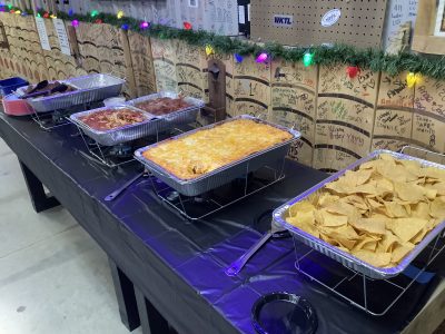 Buffet catering setup for a corporate holiday party at Axe Play.